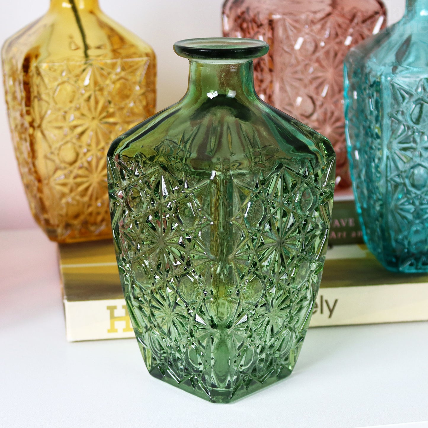 Set Of 4 Embossed Flower Coloured Bottles