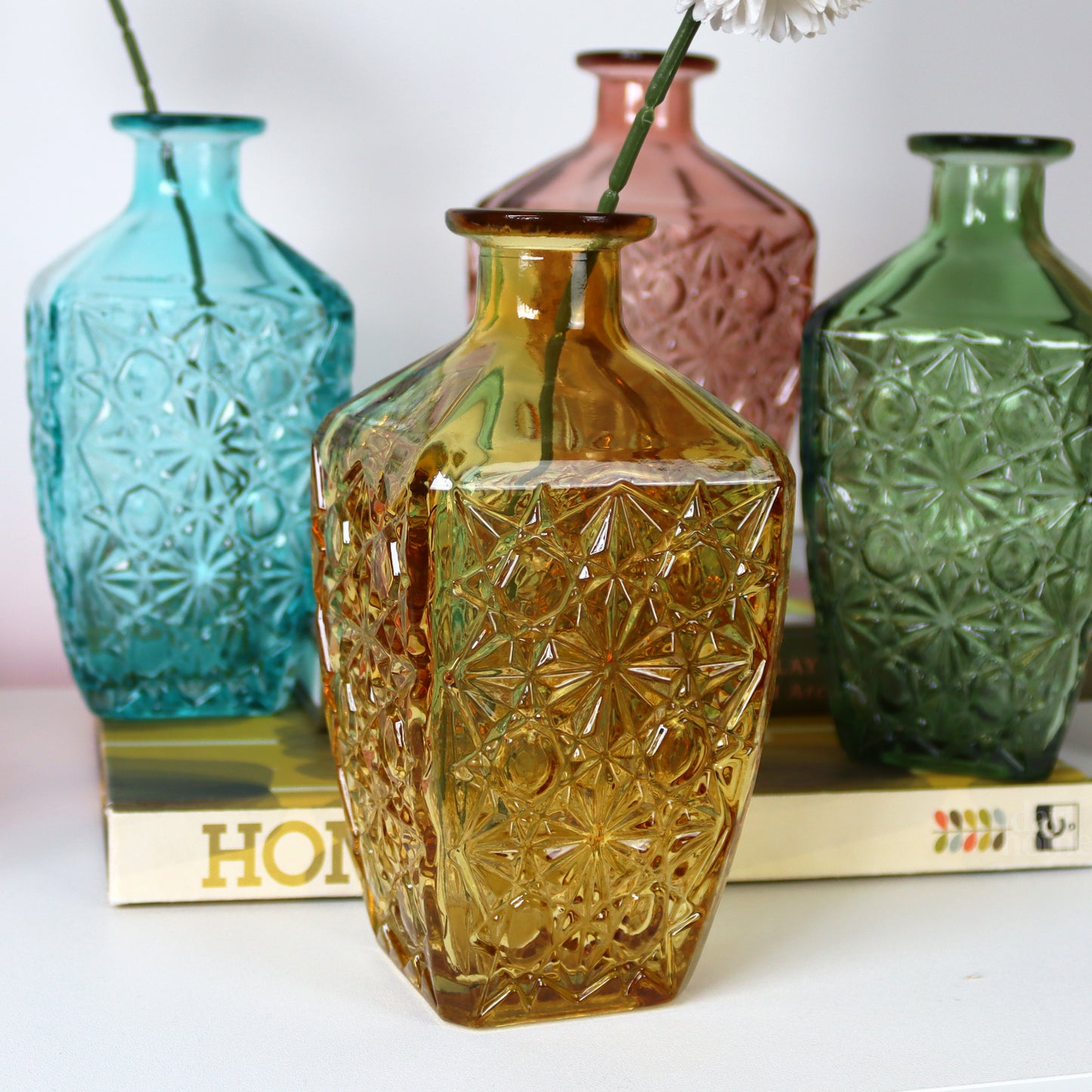 Set Of 4 Embossed Flower Coloured Bottles