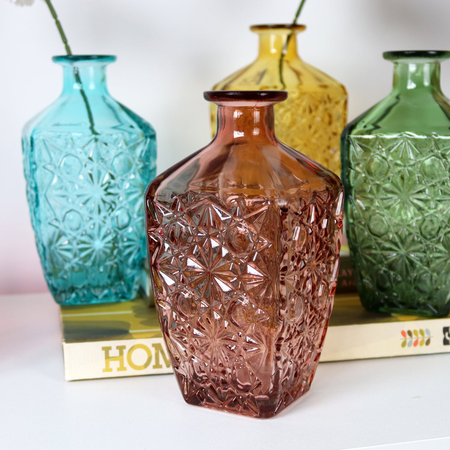 Set Of 4 Embossed Flower Coloured Bottles