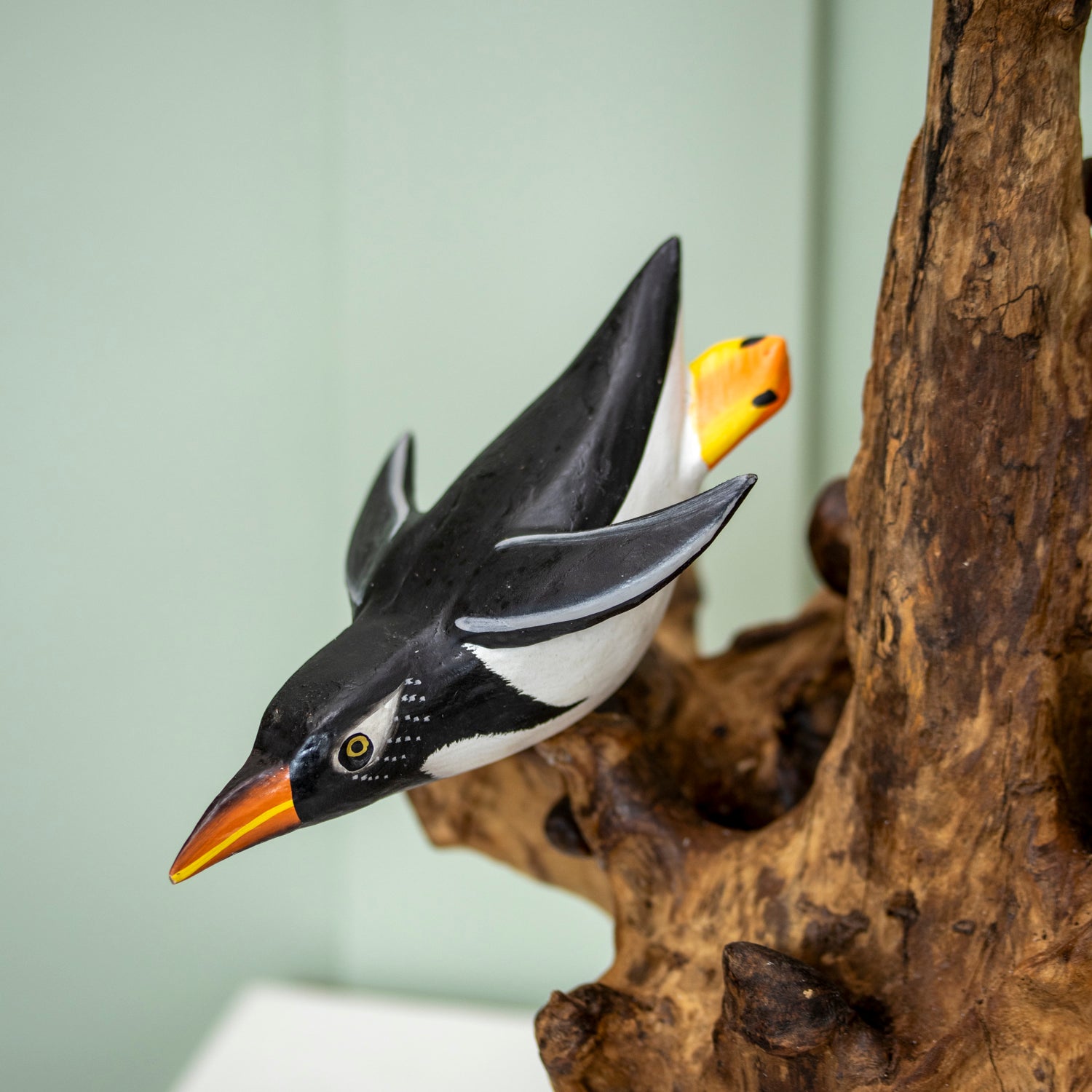 Teak Root Cliff Diving Penguins Sculpture