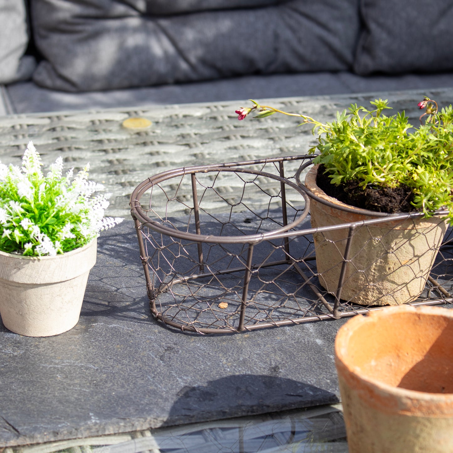 Set Of 3 Aged Terracotta Pots In Wire Basket