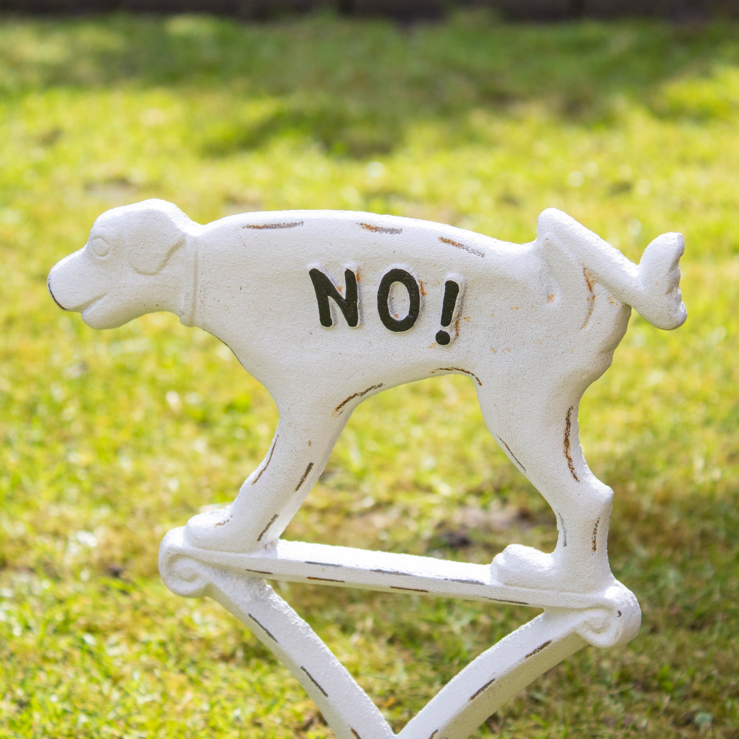 White Cast Iron No Cocking Dog Sign