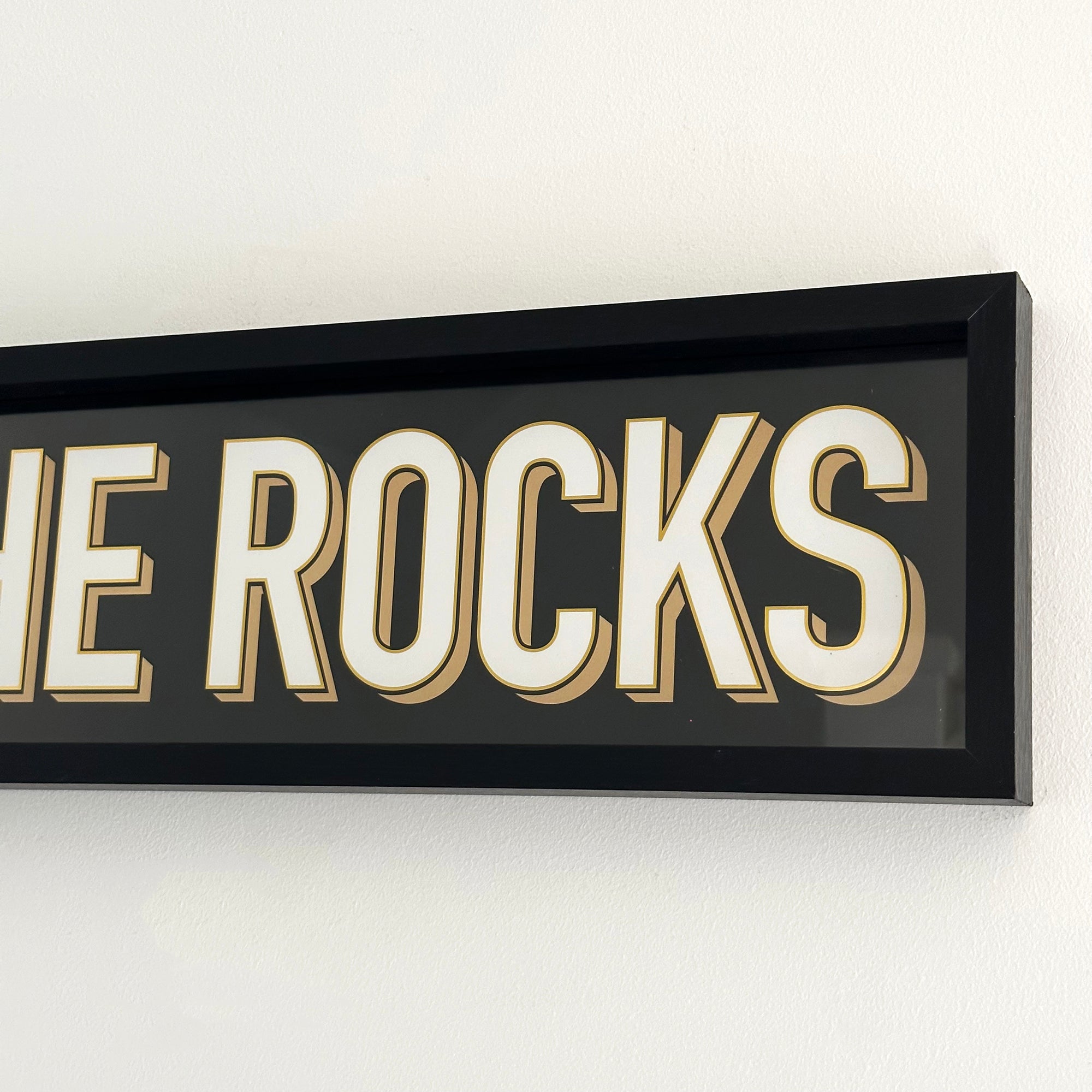 Black On The Rocks Sign