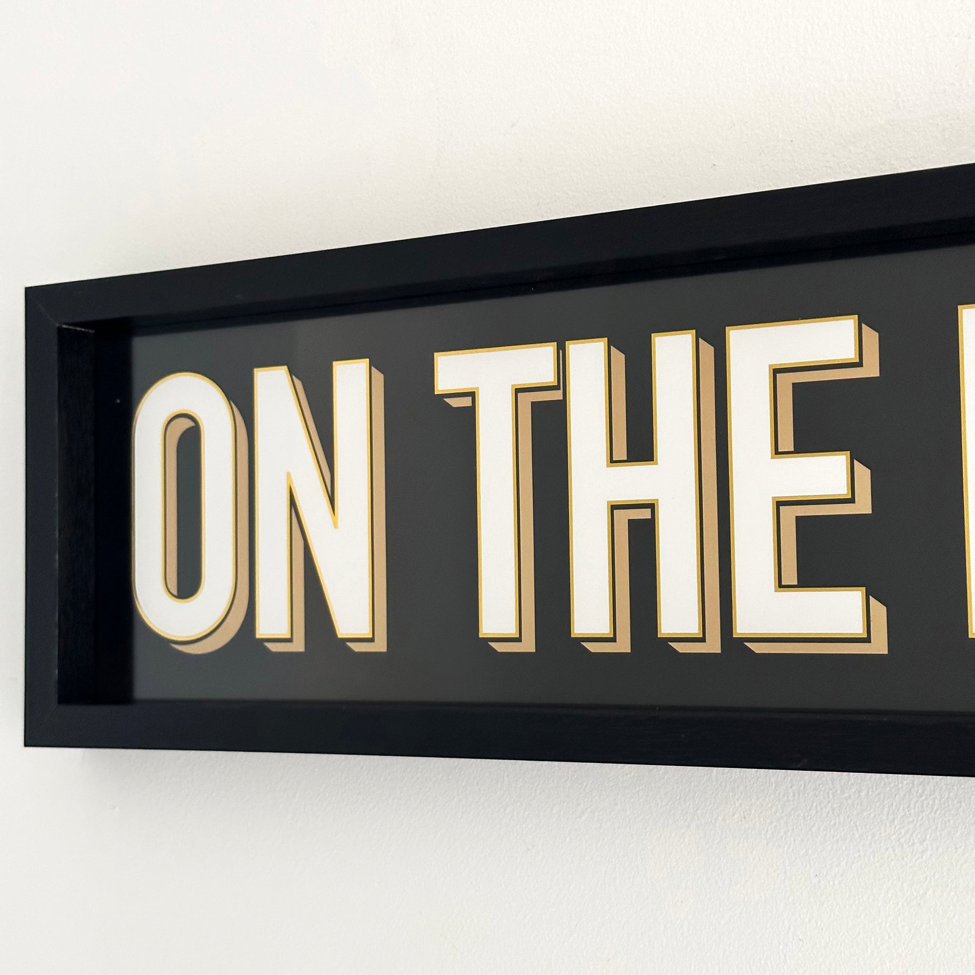 Black On The Rocks Sign