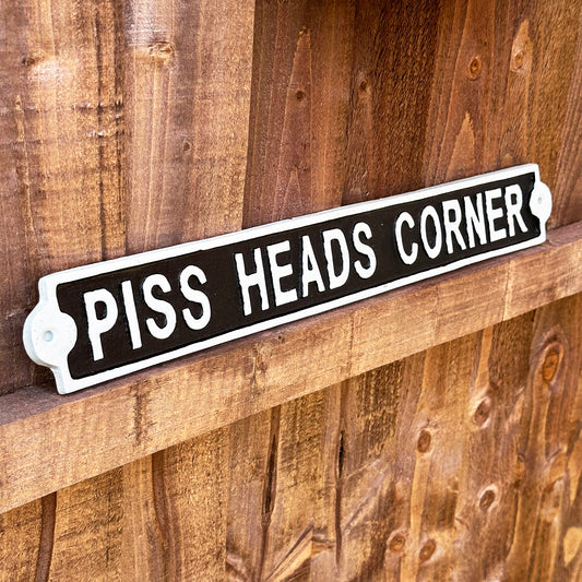 P*ss Heads Corner Sign