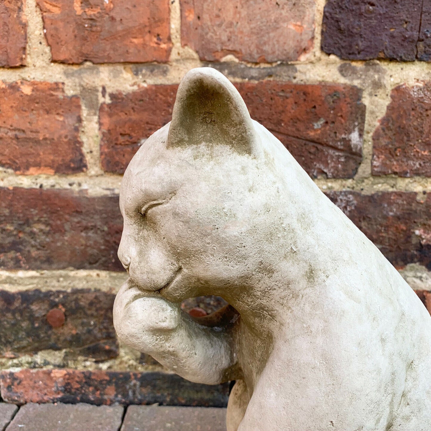 Stone Paw Licking Cat Garden Sculpture
