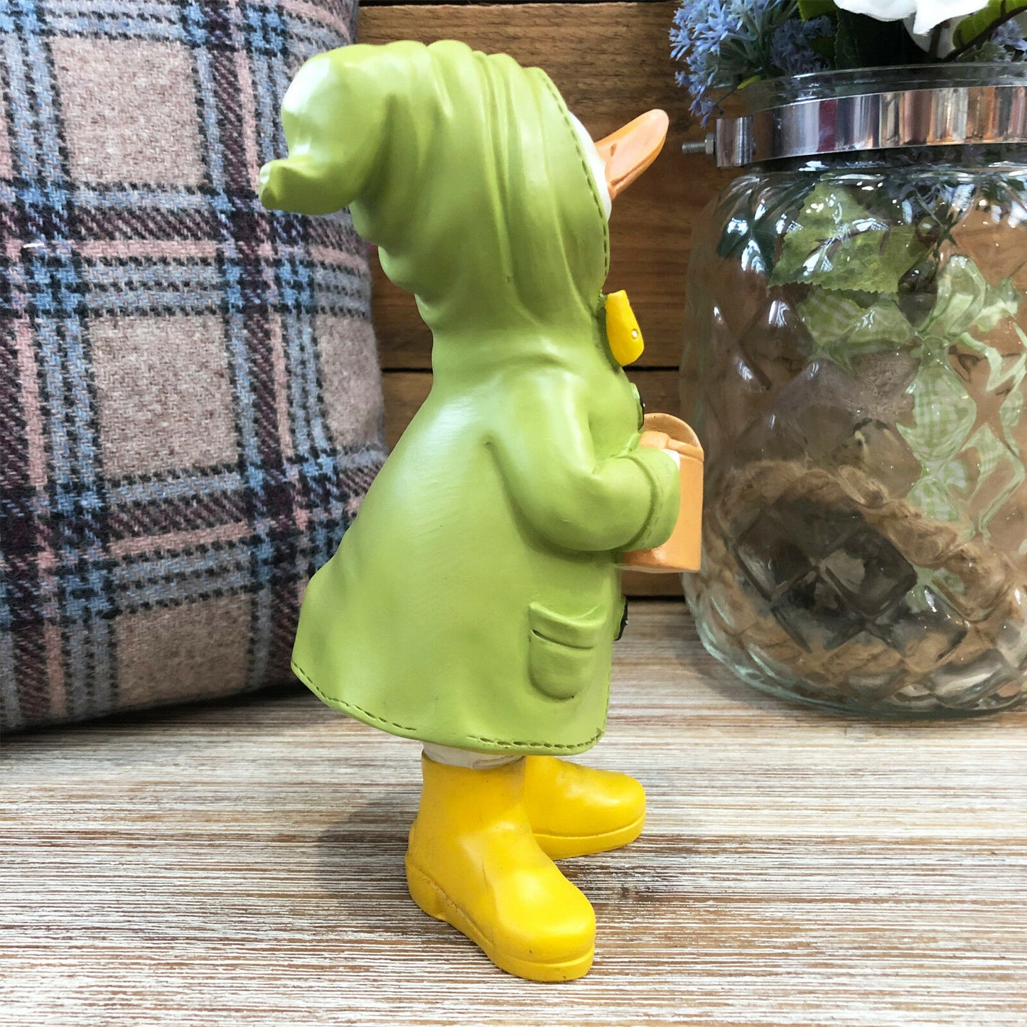 Pfützenente aus Kunstharz mit Gießkannenfigur