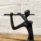 Cast Iron Flute Playing Woman Figurine