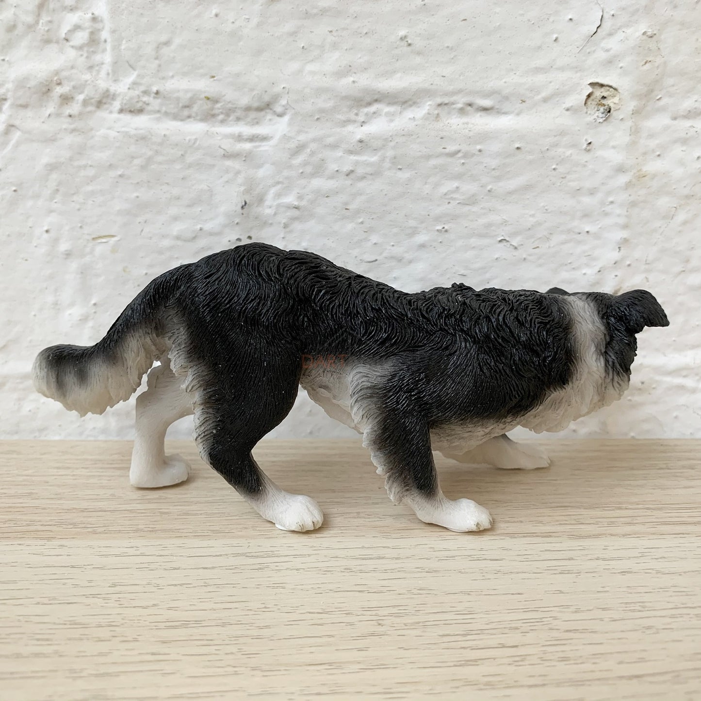 Hockende Schäferhund-Figur