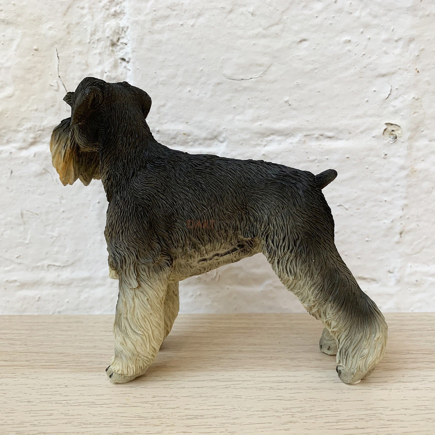 Graue deutsche Schnauzer-Hundefigur