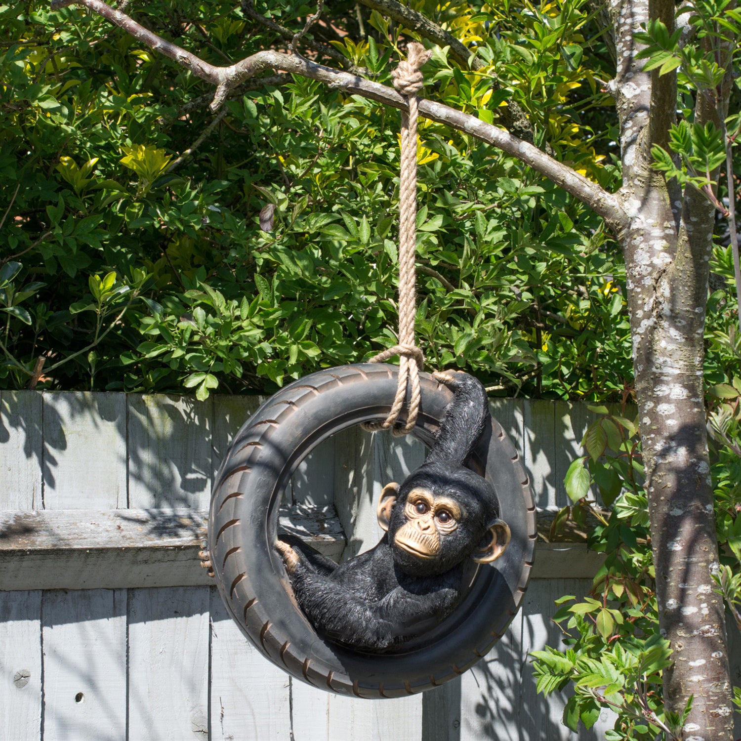 Chimpanzee On Tyre Swing Sculpture