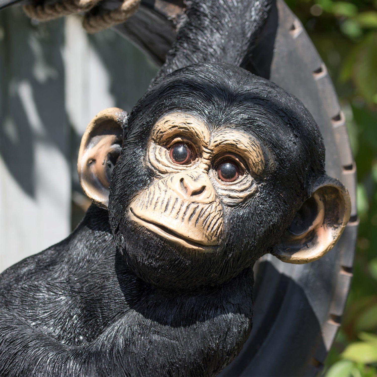 Chimpanzee On Tyre Swing Sculpture