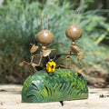 Metal Ants Pushing Wheelbarrow Sculpture
