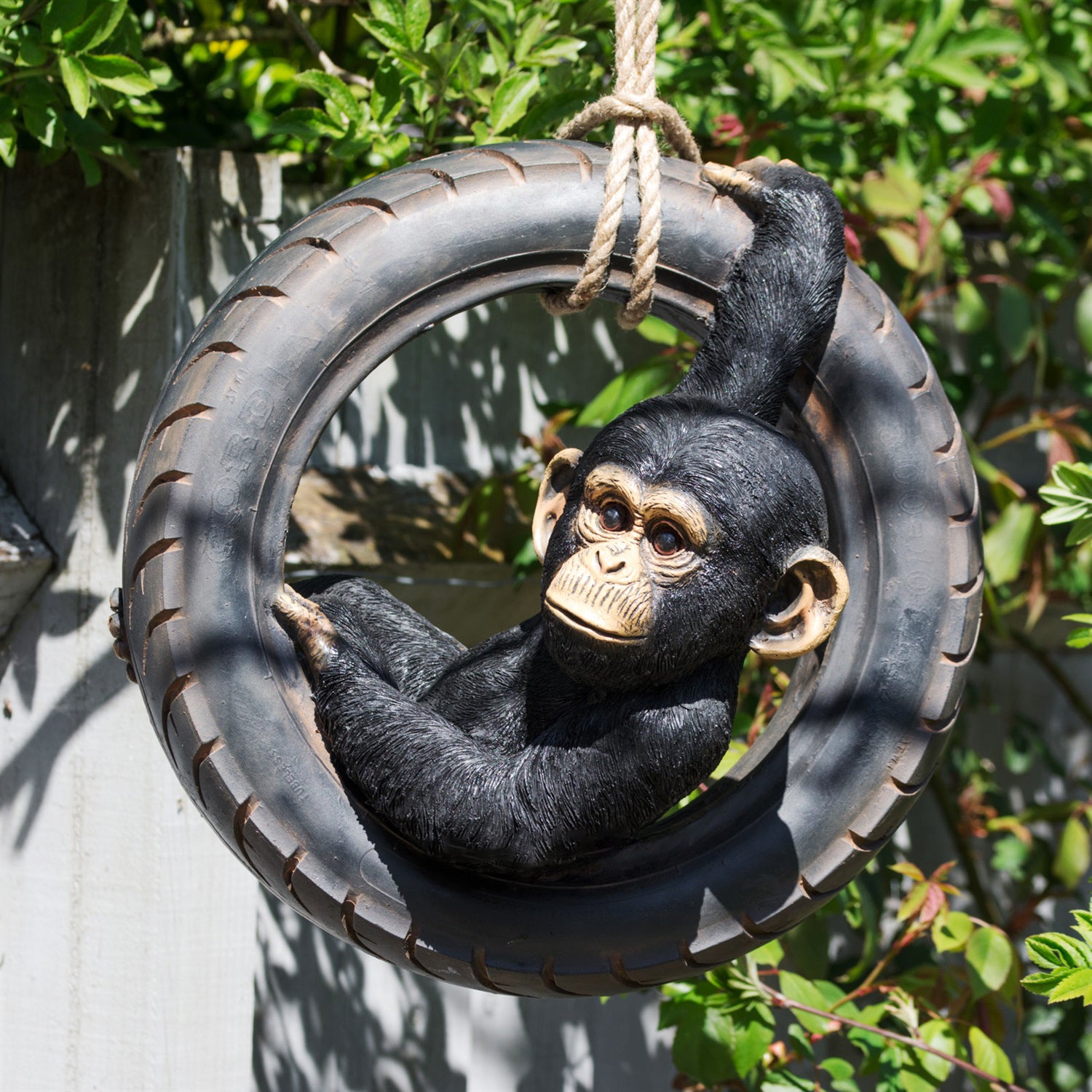 Chimpanzee On Tyre Swing Sculpture