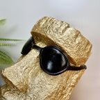 Goldene coole Osterinsel-Kopfverzierung