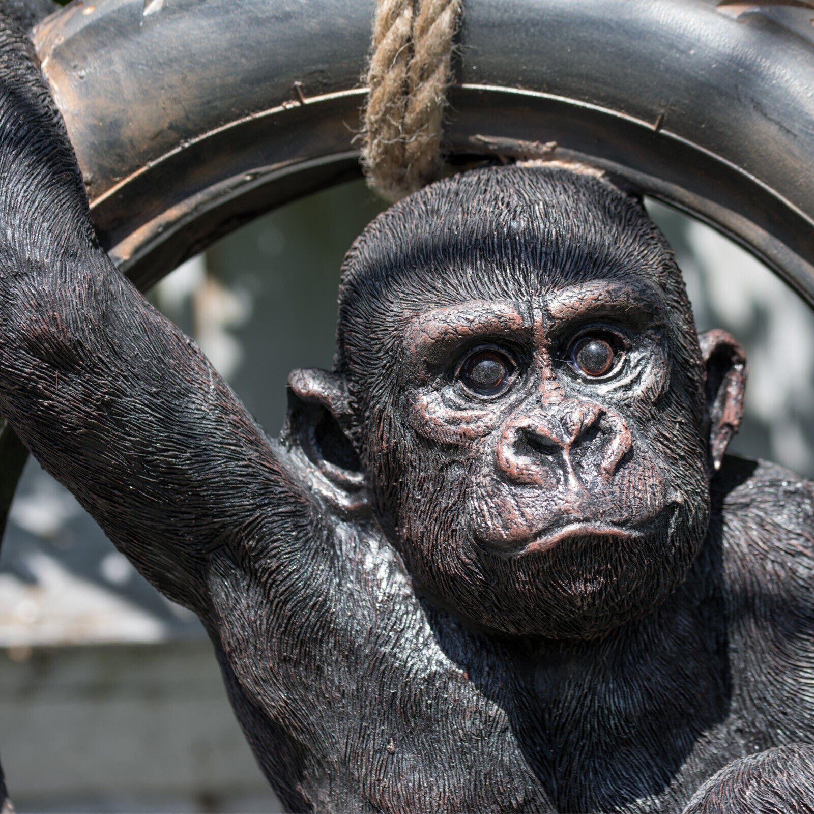 Hanging Gorilla on Tyre Swing Garden Sculpture