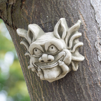 Stone Smiling Bony Finger Gremlin Wall Sculpture