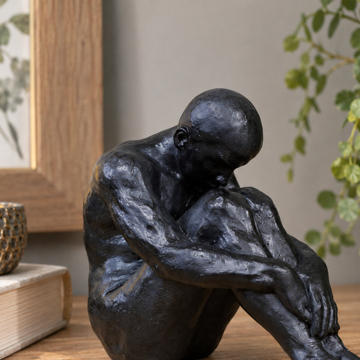 Small Bronze Sitting Man Sculpture