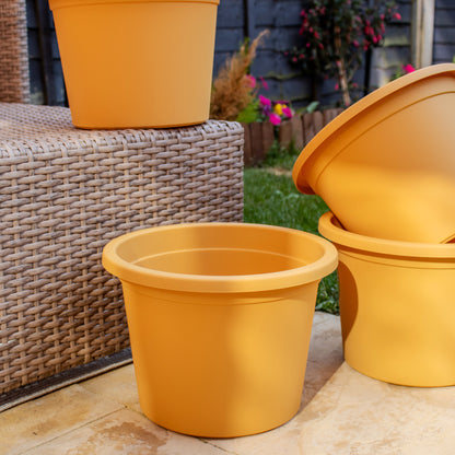 Set Of 4 Mustard Plastic Cylinder Planters