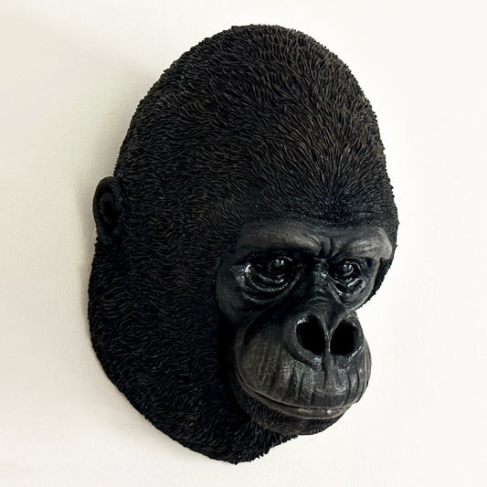 Schwarze Gorillakopf-Wandskulptur