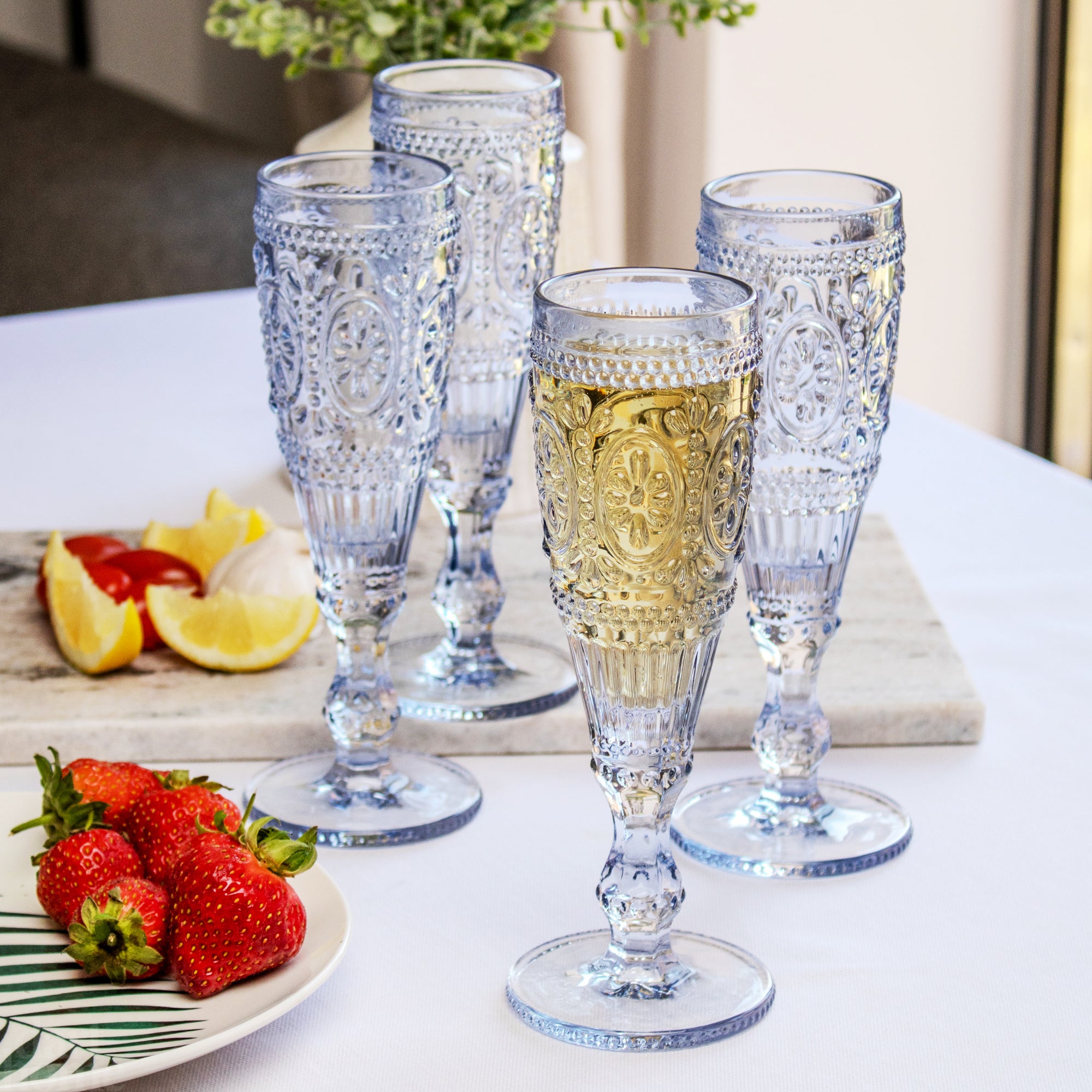 Set Of 4 Blue Embossed Flute Glasses