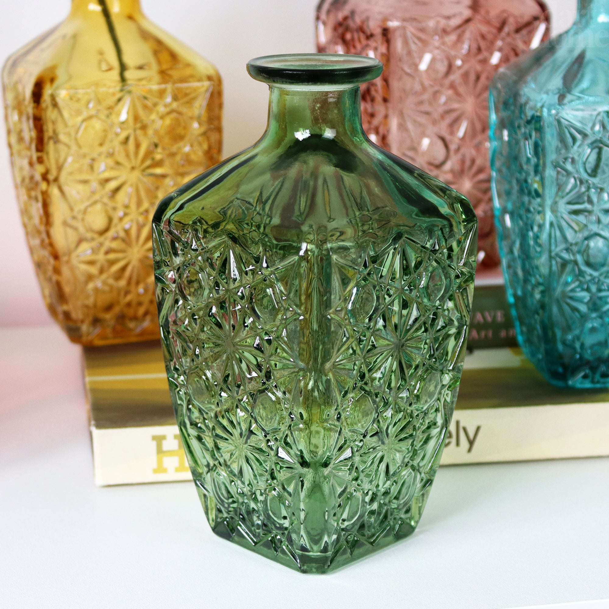 Set Of 4 Embossed Flower Coloured Bottles