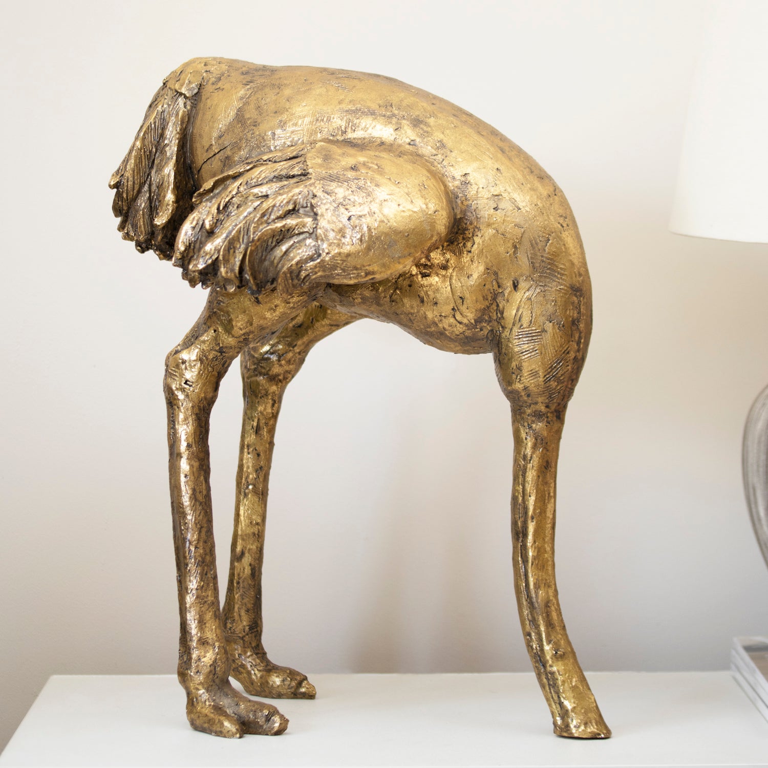 Gold Ostrich Head In Sand Ornament