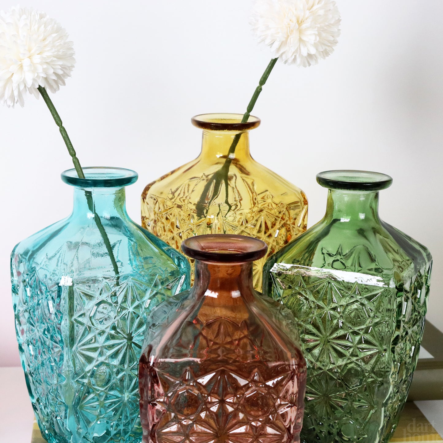 Set Of 4 Embossed Flower Coloured Bottles