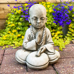 Stone Drummer Monk Sculpture