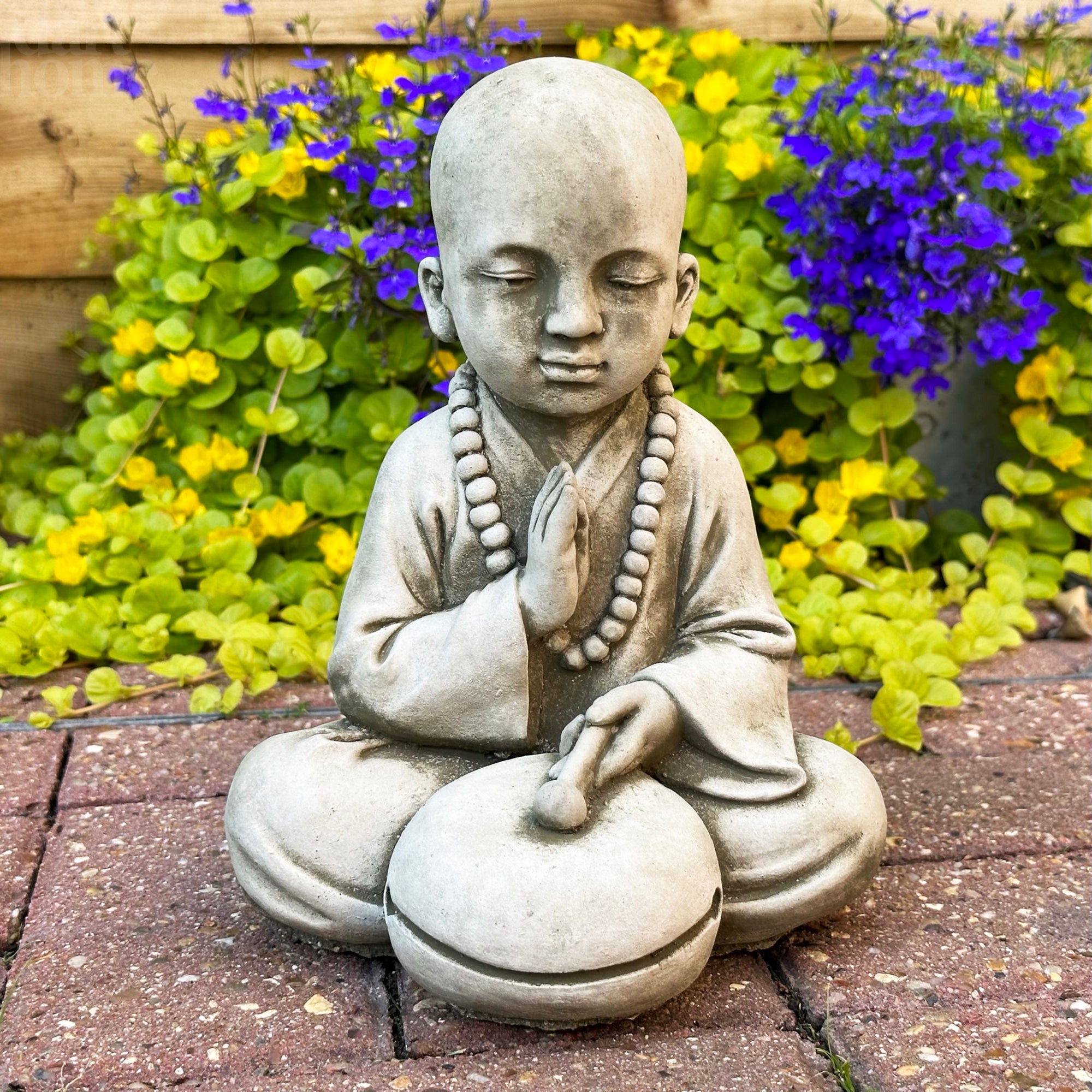 Stone Drummer Monk Sculpture