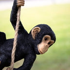Black Swinging Monkey Garden Sculpture