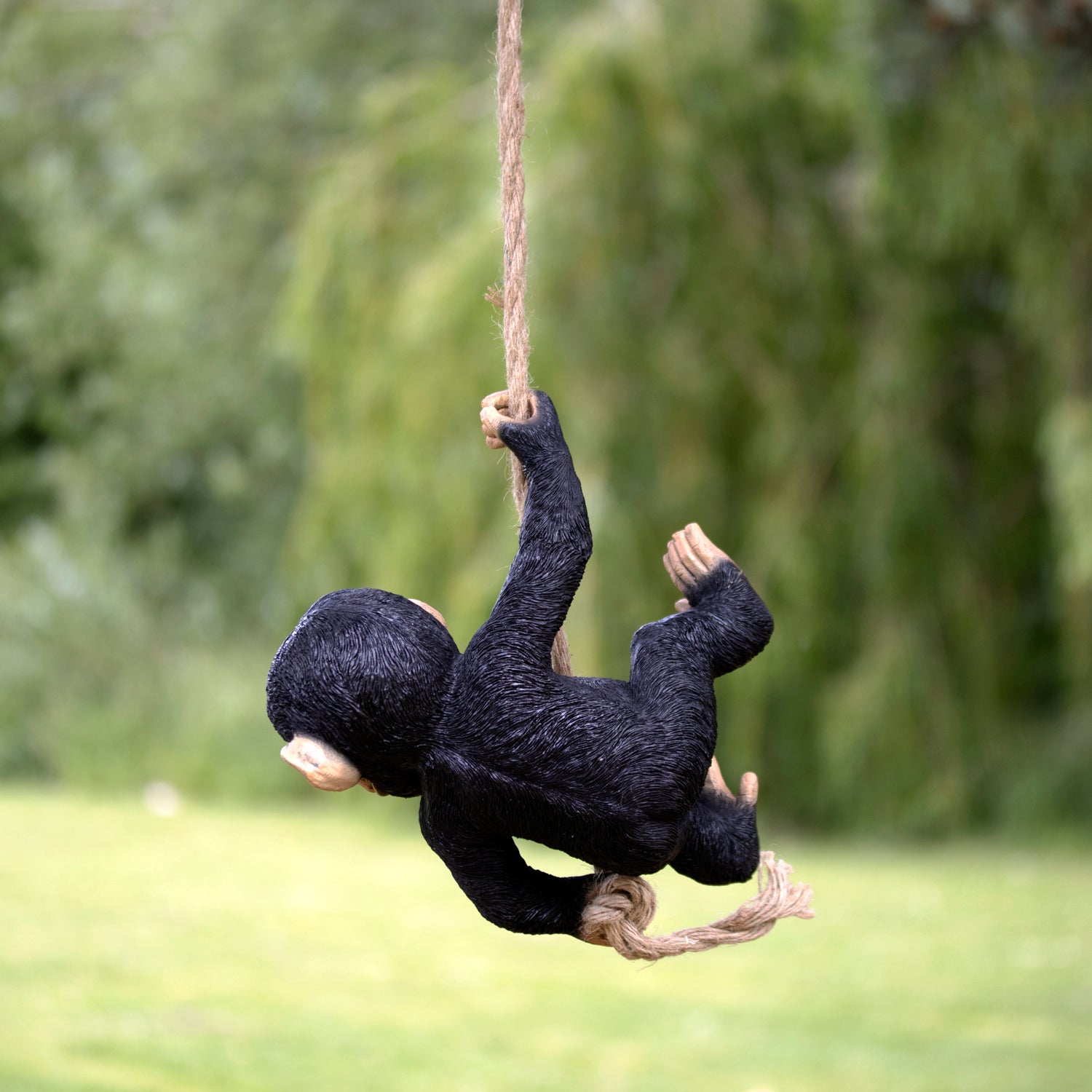 Black Swinging Monkey Garden Sculpture