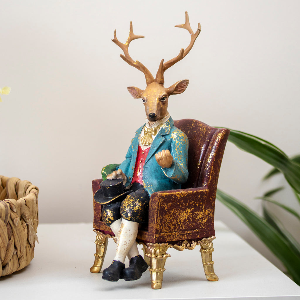 Gentleman Stag in Armchair Ornament