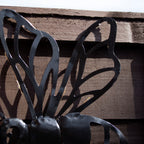 Black Metal Buzzy Bee Solar Wall Art