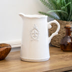 White Ceramic Fleur De Lis Jug