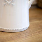 White Ceramic Fleur De Lis Jug