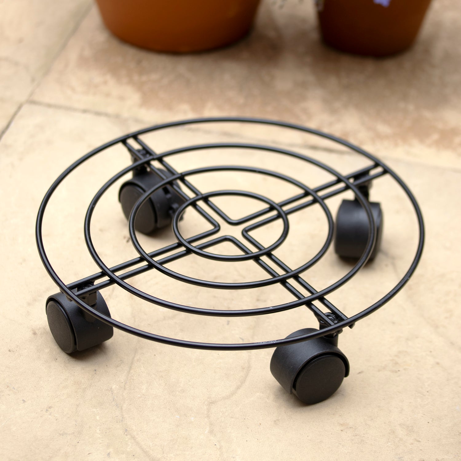 Black Metal Plant Stand On Wheels