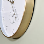 White And Gold Oval Wall Clock