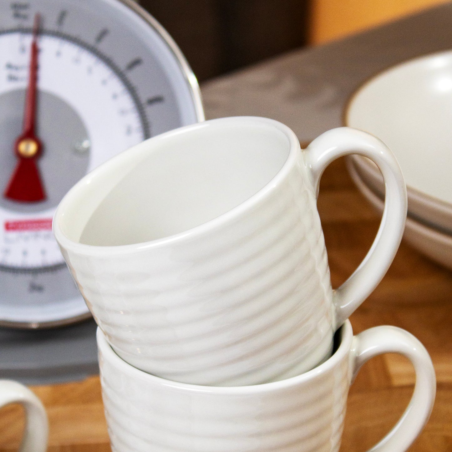 Set Of 4 Cream Embossed Rings Mugs