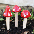 Set Of 12 Mini Red Ceramic Toadstool Stakes