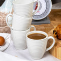 Set Of 4 Cream Embossed Rings Mugs