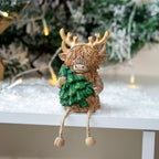 Brown Highland Cow With Christmas Tree Ornament