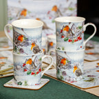 Set mit 4 Weihnachtstassen mit Rotkehlchenmotiv in Geschenkbox