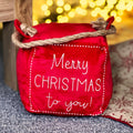Quadratischer Türstopper „Merry Christmas To You“.