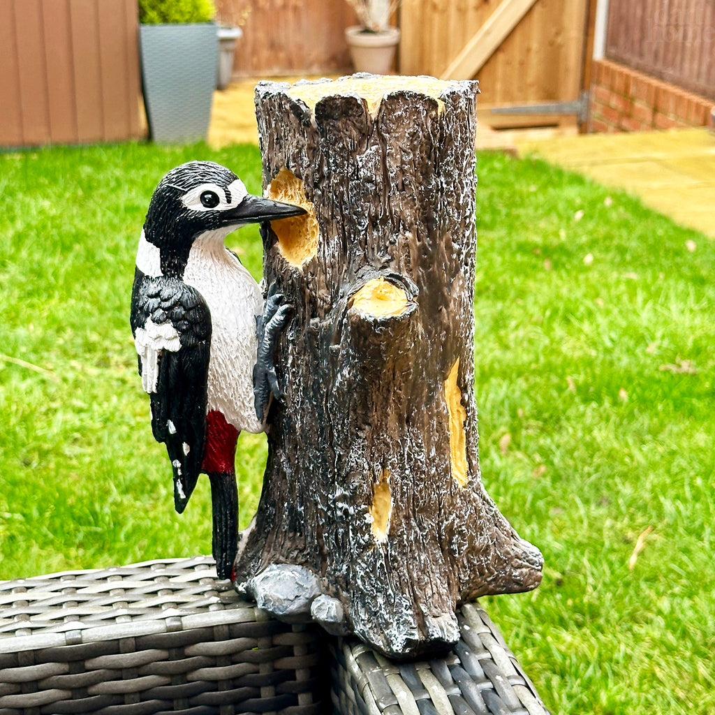 Spotted Woodpecker On Tree Statue
