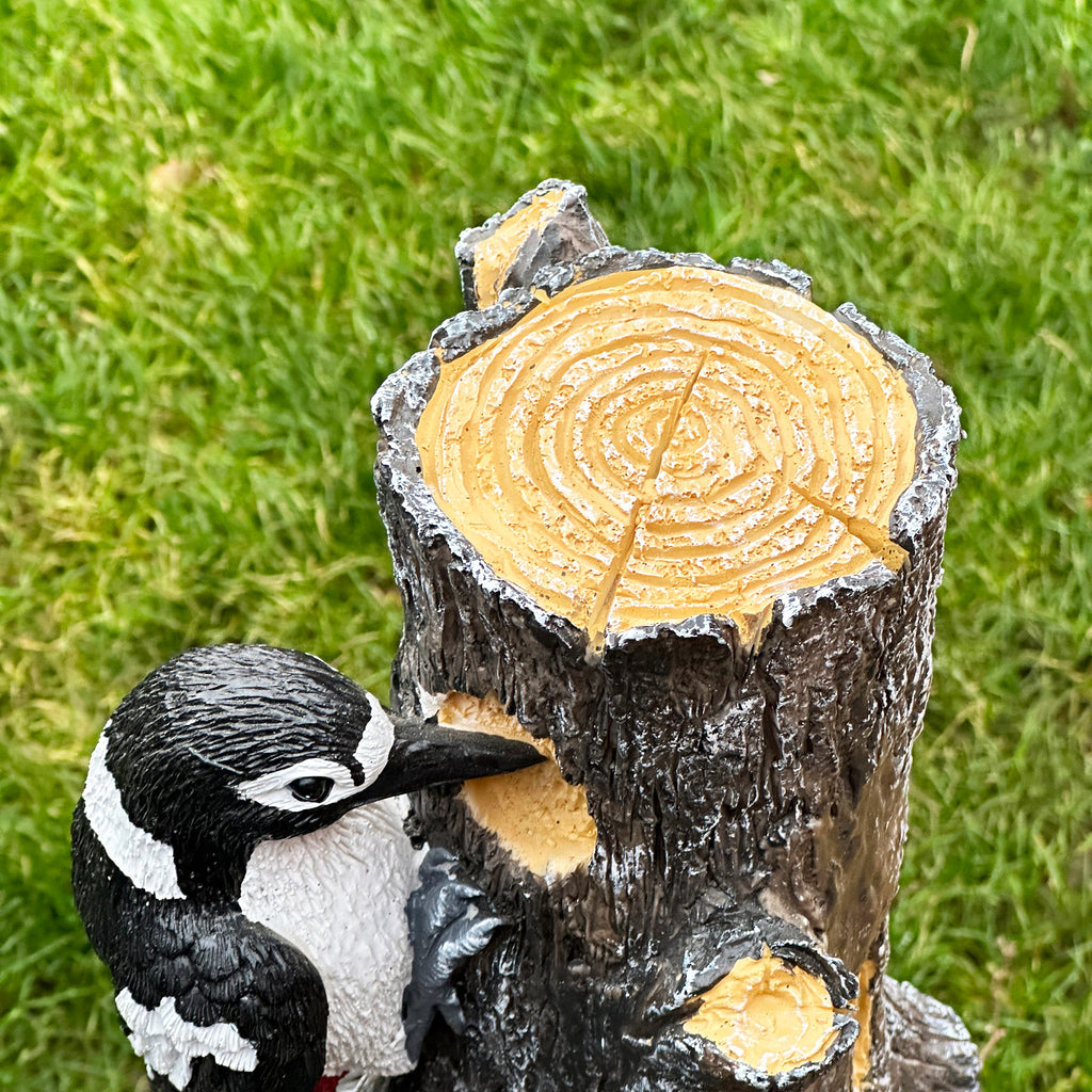 Spotted Woodpecker On Tree Statue