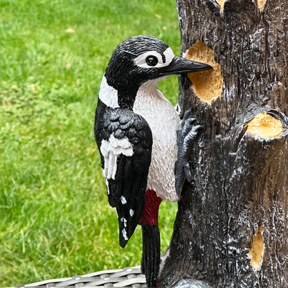 Spotted Woodpecker On Tree Statue