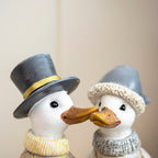 Sitting Christmas Ducks On Bench Ornament