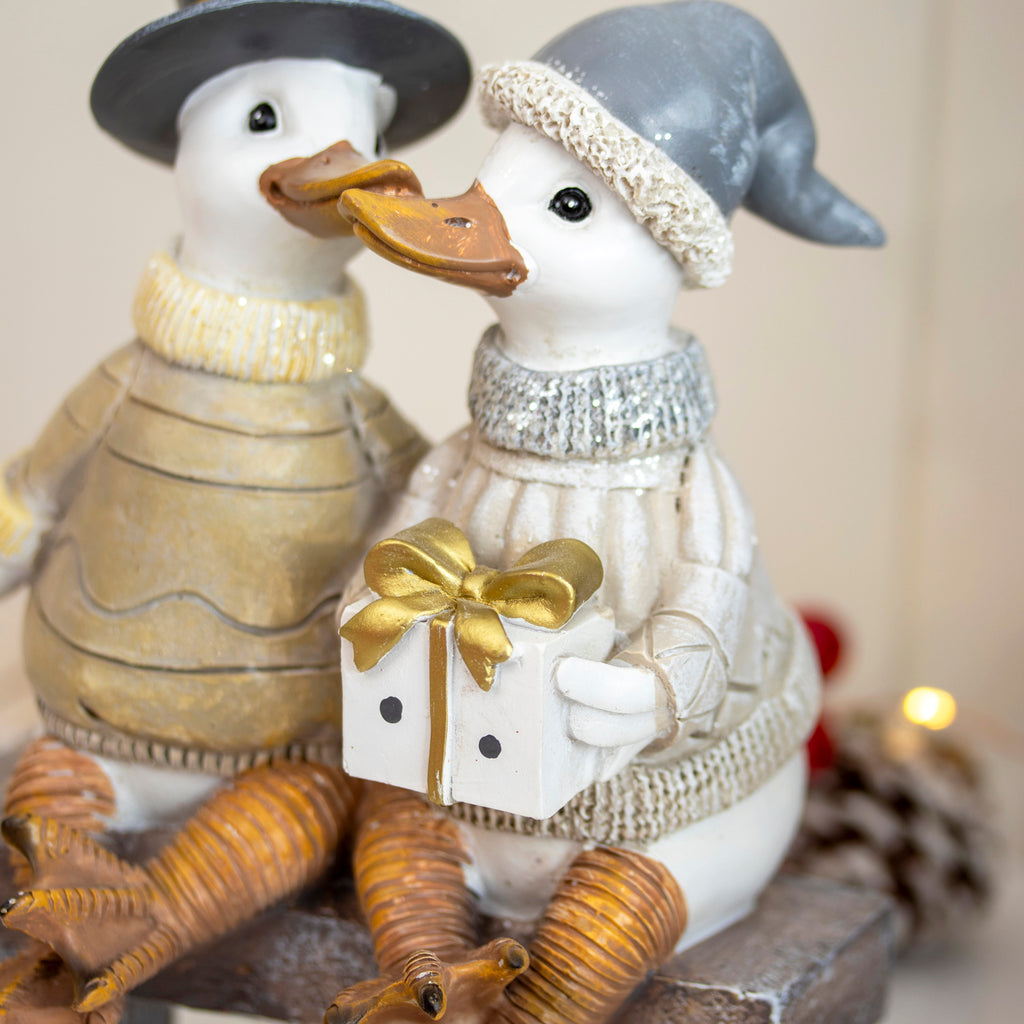 Sitting Christmas Ducks On Bench Ornament