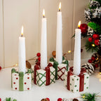Set Of 4 Christmas Present Candlestick Holders